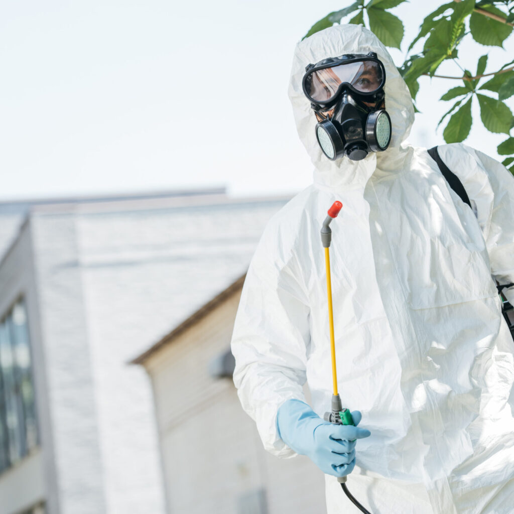 low angle view of pest control worker standing wit rf2py7g scaled 1.jpg